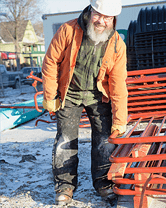 Workers with ice traction system on shoes